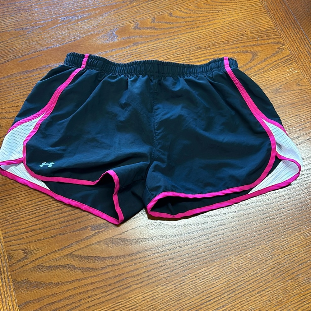 Under Armour running shorts, size medium.